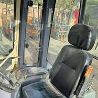 Chargeuse-pelleteuse d'occasion de 7,8 tonnes en stock avec godet de chargement avant et bras d'excavation arrière pour le marché mondial