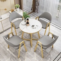 Ensemble de table à manger ronde moderne de luxe écologique facile à nettoyer pour 4 personnes, mobilier commercial en métal pour salles à manger et hôtels