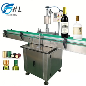 Machine automatique de rétraction et de scellage de capsules thermorétractables en PVC pour bouteilles de vin - Product Image 1
