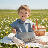 Bavoirs pour bébé à manches longues en PU imperméable, colorés, à prix avantageux, avec logo personnalisé et poche, pour l'alimentation des tout-petits