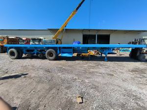 Remolque de Plataforma de Servicio Pesado de <span class=keywords><strong>Cuatro</strong></span> Ejes <span class=keywords><strong>y</strong></span> <span class=keywords><strong>Ochenta</strong></span> Toneladas para Transporte de Carga, Semirremolque Portacontenedores - Product Image 2