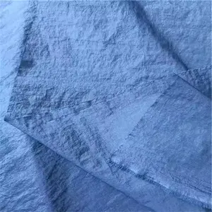 ขายร้อน 100% ไนลอน 228T ไนลอน Taslan ผ้ากันน้ํากันลม Crinkle Taslon ผ้า TPU สําหรับเสื้อผ้าแจ็คเก็ต