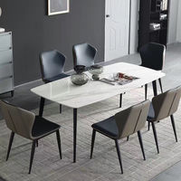 Ensemble de table à manger en marbre moderne avec 6 chaises et structure en fer pour restaurant