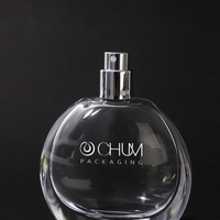 Logo personnalisé de gros 50ml oblate atomiseur vaporisateur de parfum en verre avec bouchon à bille ronde avec processus d'enroulement vert Surlyn