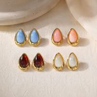 Boucles d'oreilles ovales élégantes et simples avec un design rétro et sophistiqué en résine en forme de goutte d'eau.