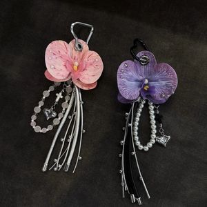 Porte-clés Y2K Phalaenopsis avec pendentif à pompon, chaîne de perles faite à la main, fleur d'orchidée unique, porte-clés tendance - Product Image 1