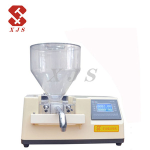 Sfoglia da tavolo piccolo riempimento manuale pastella per torta alla crema depositante tenuto in mano - Product Image 1