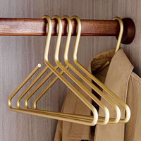 Cintre en métal doré mat robuste de haute qualité cintres de costume en alliage d'aluminium multifonctions pour vêtements