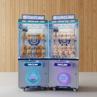 Machine à griffes pour monnaie et pièces de monnaie canadienne personnalisée pour petits jouets en peluche et grandes poupées Machine de jeu de grue à pièces Centres de jeu
