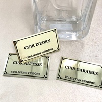 Autocollants adhésifs de luxe personnalisés pour parfums, étiquettes dorées imperméables, tampons UV transparents, vinyle estampé sur mesure