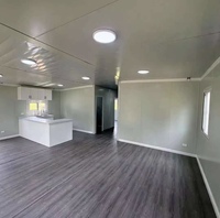Maison conteneur extensible de 20 pieds - Maison modulaire préfabriquée avec cuisine et salle de bain complètes, prête à l'emploi pour dortoirs, complexes hôteliers et gîtes.