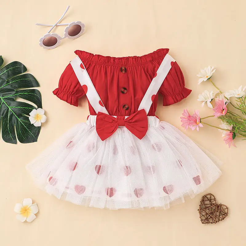 Ropa de verano para niñas, camiseta de moda europea y americana, falda de tirantes, conjunto de 2 piezas, traje de falda de amor para bebé