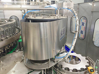 Machine de remplissage automatique commerciale d'eau gazeuse et de boissons, haute capacité, contrôlée par PLC, pour ligne de production de bouteilles PET, avec boîtier d'engrenages