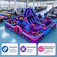 Parcours d'obstacles gonflable géant commercial avec toboggans, piscine à balles et mur d'escalade pour enfants