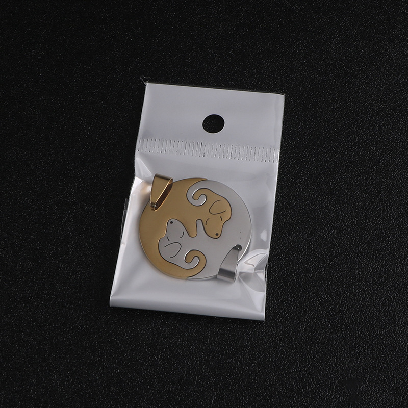 Coppia di pendenti in oro e bianco (senza catena)