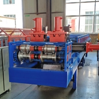 Machine de formage à froid de barres inférieures en acier galvanisé de bonne qualité pour portes à enroulement, machine de fabrication de barres inférieures en T