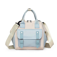 Sac à langer moderne pour bébé avec organisateur de couches suspendu