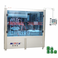 Machine automatique de remplissage et d'étiquetage de bouteilles de déodorant