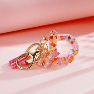Pendentif polyvalent tendance en alliage, motif papillon et alphabet, idéal pour porte-clés et sacs – Nouvelle collection très prisée - Product Image 1