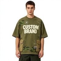 T-shirt pour homme en tricot vert olive à col rond, imprimé graphique camouflage, coupe ample, manches courtes, poche cargo, logo personnalisé, streetwear