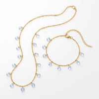 QIAOREN 11935 Parure de bijoux étanche en zircone bleue, collier et bracelet en acier inoxydable doré, cadeau pour femme US