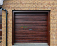 Porte à volet roulant électrique Porte élévatrice en acier résistant au vent avec finition de surface coupe-vent et robuste Usine d'entrepôt