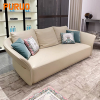 Canapé modulaire Chesterfield Puruo au design moderne, mobilier de salon de luxe, canapé en cuir confortable orange pour chambre d'hôtel