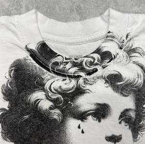 เสื้อยืดคอกลมแขนสั้นทรงหลวมสไตล์วินเทจคุณภาพสูงสำหรับวัยรุ่น ผลิตจากผ้าฝ้าย 100% - Product Image 5