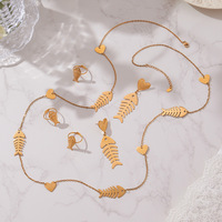Ensemble de bijoux pour femme tendance en acier inoxydable plaqué or 18 carats, collier, boucles d'oreilles, bague et pendentif en forme d'arête de poisson, idéal pour un cadeau de fiançailles
