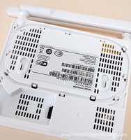 F690V Modem Fiber Optik XPON ONU Gigabit Empat Port dengan Adaptor Daya Versi Bahasa Inggris untuk Perdagangan Luar Negeri