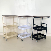 Table d'appoint en acier au carbone avec 2 niveaux de rangement et roulettes