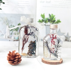 Bottiglie di Vetro con Fiori Secchi Naturali Galleggianti in Olio, Decorazione Originale per Natale e San Valentino - Product Image 1