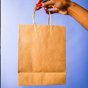 Bolsa de Papel Kraft con Asa en Forma de Mano, Personalizada por la Fábrica, con Flexografía de Lujo, para Joyería - Product Image 1