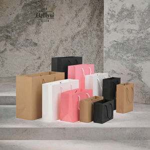 Vente chaude Sacs de shopping cadeaux de luxe en papier kraft brun blanc noir avec poignées et ruban jetables Impression de logo personnalisée - Product Image 3