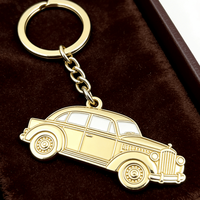 Porte-clés en métal personnalisé avec logo sur mesure en alliage de zinc pour promotion de boutique touristique, cadeau commémoratif, vente en gros