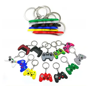 PVC nouveaux porte-clés machine de jeu individuelle porte-clés mini dessin animé manette de jeu fit garçon cartable bibelot cadeaux d'anniversaire