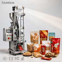 Machine d'emballage automatique industrielle en acier inoxydable pour l'emballage de collations aux cacahuètes, avec pesage de granulés et scellage de sachets