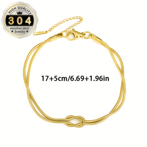 สร้อยข้อมือสตรีสแตนเลสชุบทอง 18K แฟชั่นเรียบง่ายรูปทรงงูพร้อมกระดุมแบบพันรอบสำหรับขายส่ง - Product Image 6
