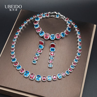 Ensemble de collier, bracelet et boucles d'oreilles en zircon rouge et bleu de luxe pour femmes, bijoux élégants en cristal pour mariage, soirée, robe de soirée