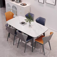 Ensemble table et chaises en pierre, design rectangulaire convertible, style italien, finition brillante, luxe léger, minimaliste