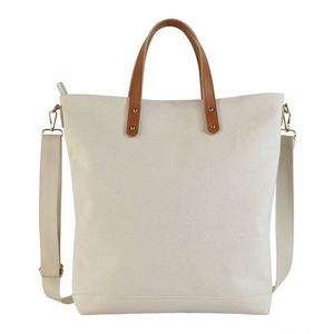 Bolso de Mano Personalizado de Lona Vintage con Cierre de Cremallera y Asas de Cuero - Product Image 1