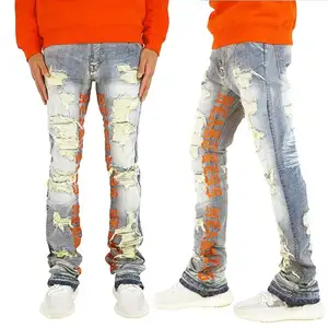 Streetwear Jeans en denim déchiré imprimé de lettres pour hommes Fabricant en gros Jeans vieillis personnalisés Jeans évasés empilés de créateurs