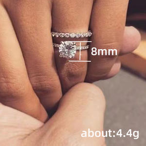 Anillo de Compromiso de Diamantes en Oro Blanco para Mujer Q018, Corte Brillante Redondo, Color G Natural, Piedras Laterales - Product Image 5