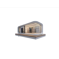 Maison conteneur modulaire en acier pliable moderne, type Apple Cabin, utilisable comme hôtel, entrepôt, bureau ou logement.