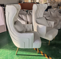 Fauteuil de salon moderne de style classique avec pieds en acier inoxydable, dossier haut capitonné en velours, pour la maison