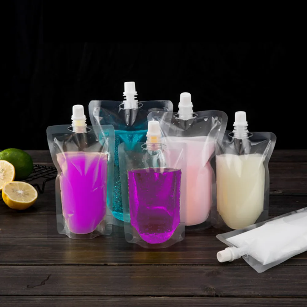 Venta al por mayor de bolsas de plástico transparente a prueba de polvo Emballage Jus De Fruit bolsas de jugo resellables Doypack bolsa de pie con pico