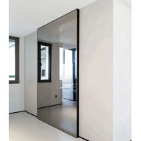 Porte coulissante invisible en verre et aluminium avec cadre mince cannelé personnalisé pour salon, montage mural, rail caché