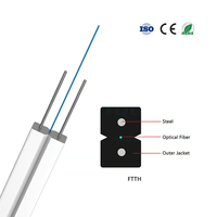 1 2 CORE 1km 2km 3km GJXFH Cable de caída de fibra óptica FTTH Cable de caída de fibra de modo único plano para interiores y exteriores