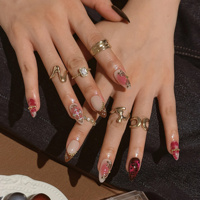 Faux ongles à presser en acrylique dégradé rose rouge, motif croix argentée, forme amande, vente en gros personnalisée pour salons de manucure