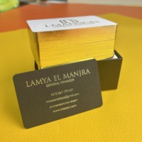 Carte de visite personnalisée de luxe feuille d'or épaisse blanche et noire en papier kraft avec bord doré